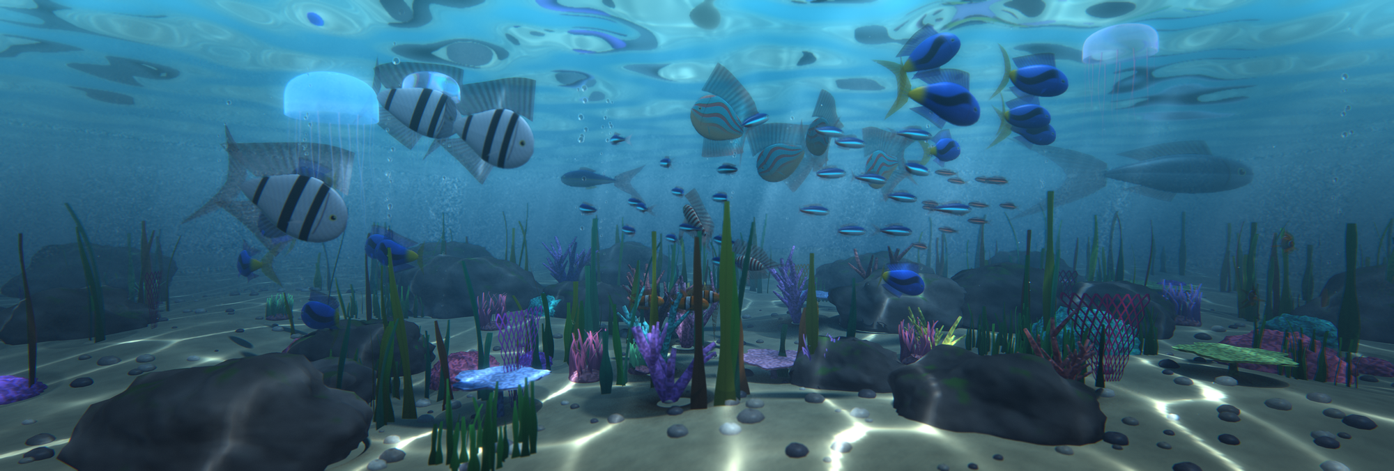 The aquarium spanning three monitors: schools of fish, coral, kelp and light shafts